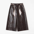 Brown women’s Gothic straight leather trousers with scarf tie detail