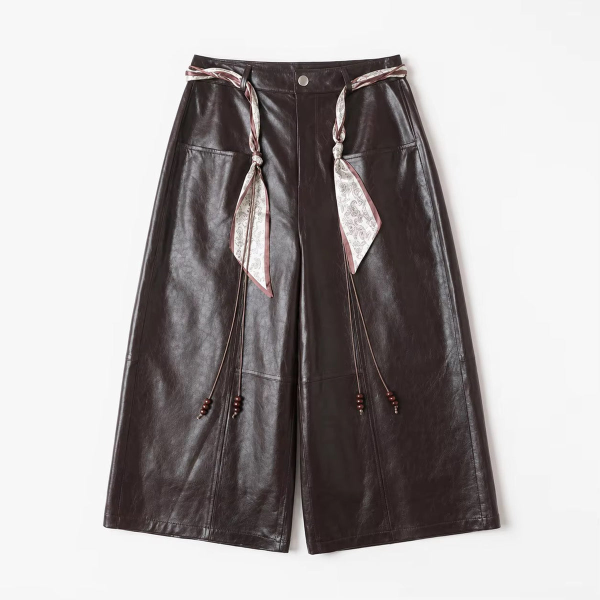 Brown women’s Gothic straight leather trousers with scarf tie detail