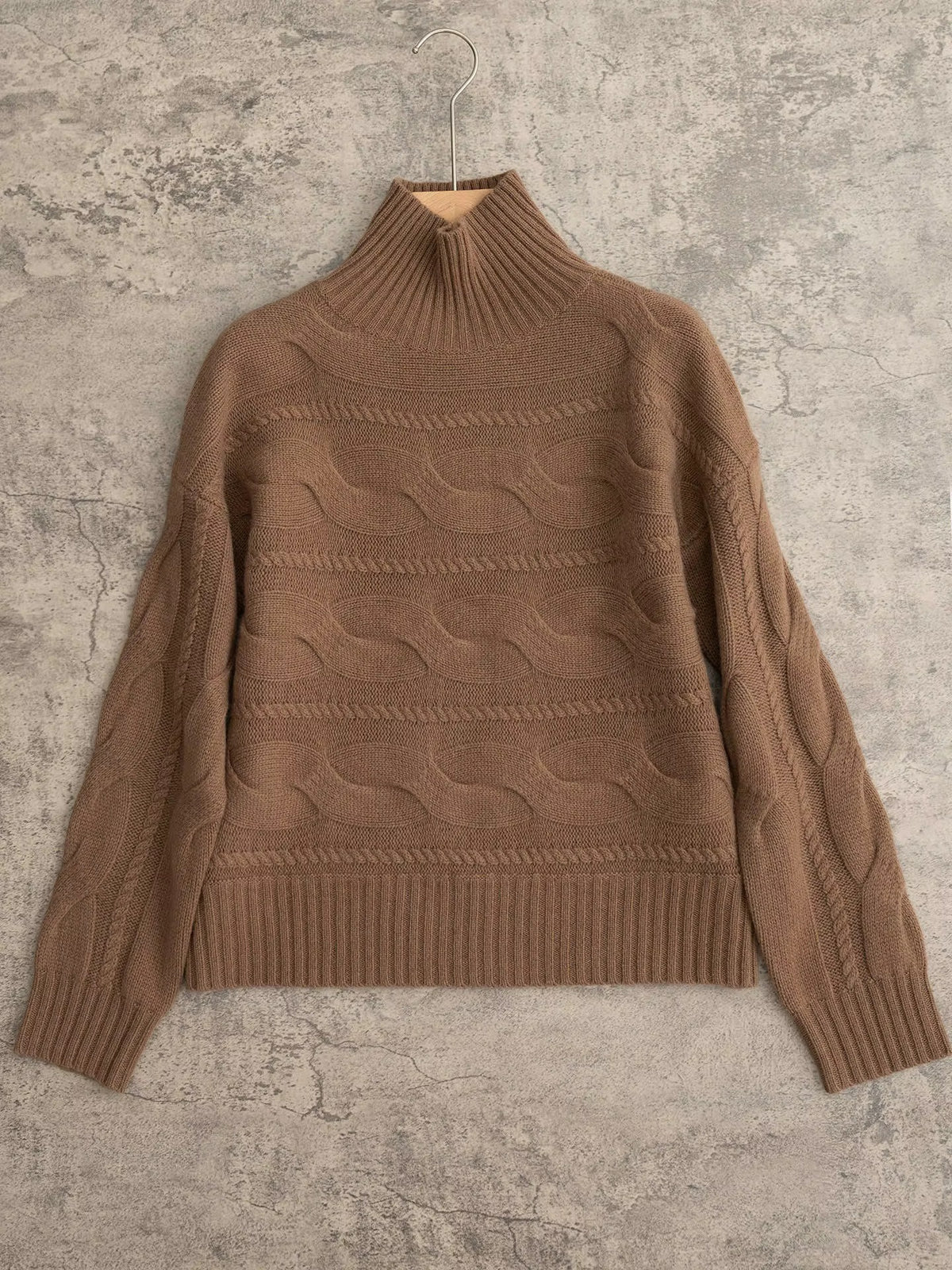 Women's brown cable-knit turtleneck jumper